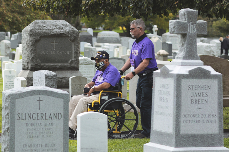 Members of the National Purple Heart Honor Mission #2 travel through the West Point Cemetery on Sept. 30 as part of a visit to learn more about the academy.