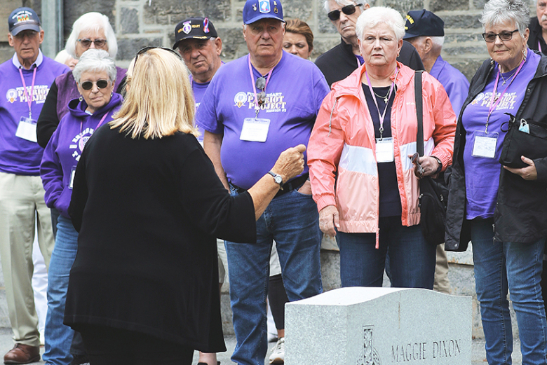 A member of the National Purple Heart Honor Mission #2 asks a question about former Army West Point women’s basketball coach Maggie Dixon and her contributions to West Point.	 Photos by Delancey Pryor III/PV