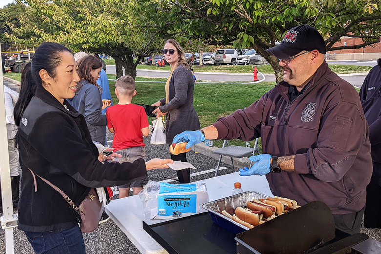 Members of the West Point community attended the West Point Fire Department’s Open House event at West Point’s Commissary and PX Parking Lot on Oct. 12. Firefighters provided food and information, while demonstrating their gear, equipment and techniques they use when responding to an emergency.    		(Photo by Dave Conrad/Garrison PAO) 