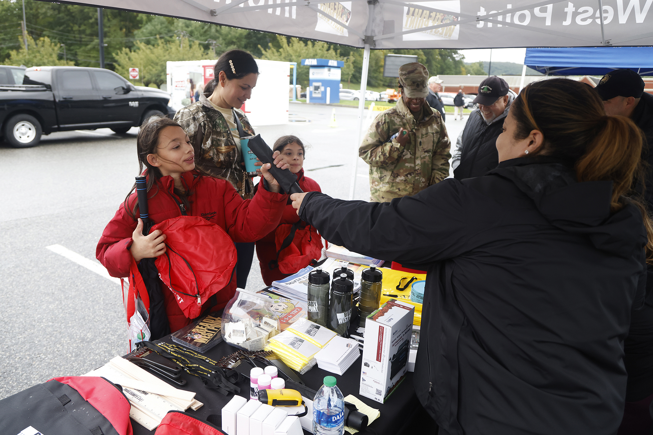 A few hundred West Point community members braved the chilly, inclement weather as the Directorate of Plans, Training, Mobilization and Security hosted the annual Emergency Preparedness Fair Sept. 30 at the West Point Post Exchange parking lot.   (Photo by Eric S. Bartelt/PV)