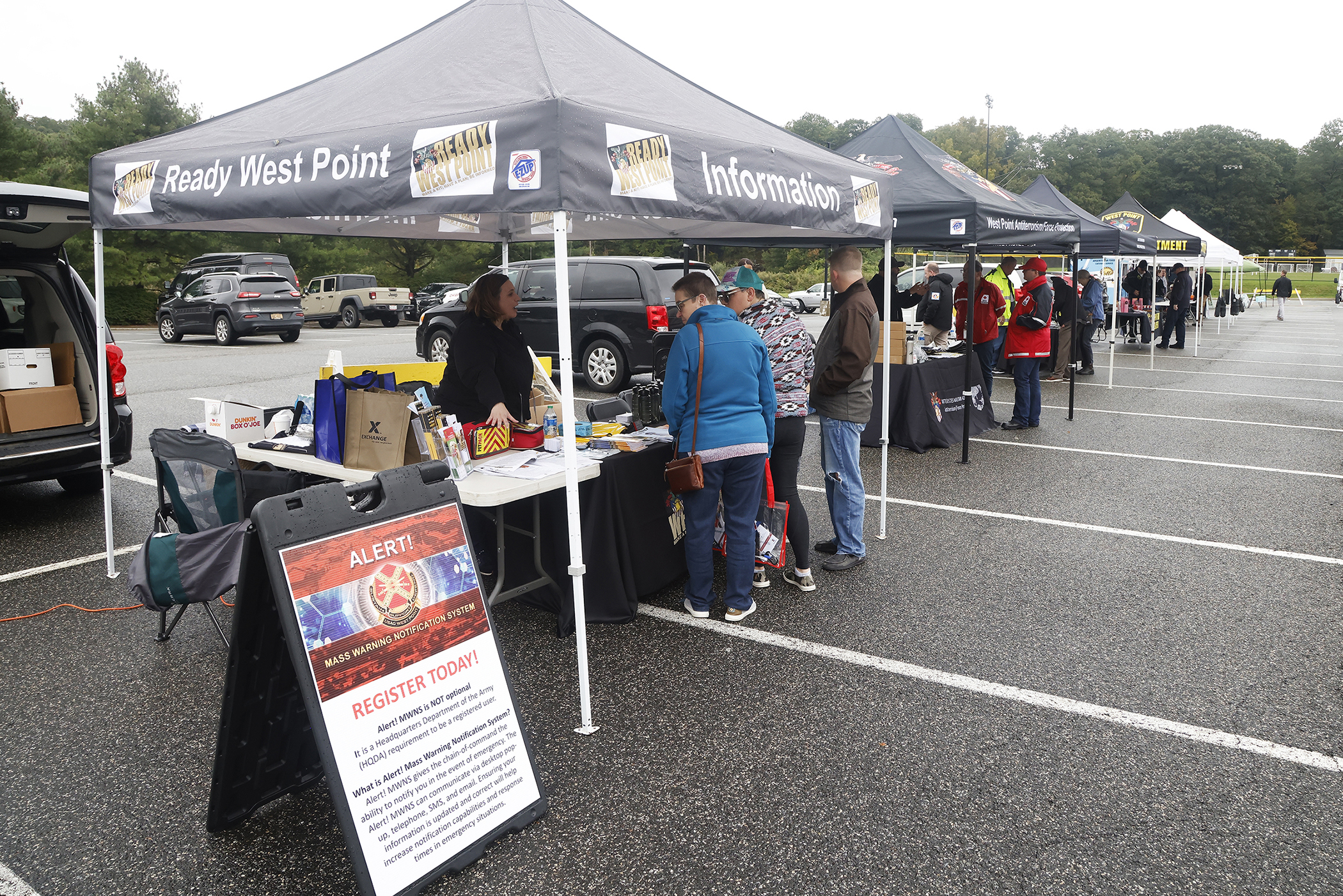 A few hundred West Point community members braved the chilly, inclement weather as the Directorate of Plans, Training, Mobilization and Security hosted the annual Emergency Preparedness Fair Sept. 30 at the West Point Post Exchange parking lot.   (Photo by Eric S. Bartelt/PV)
