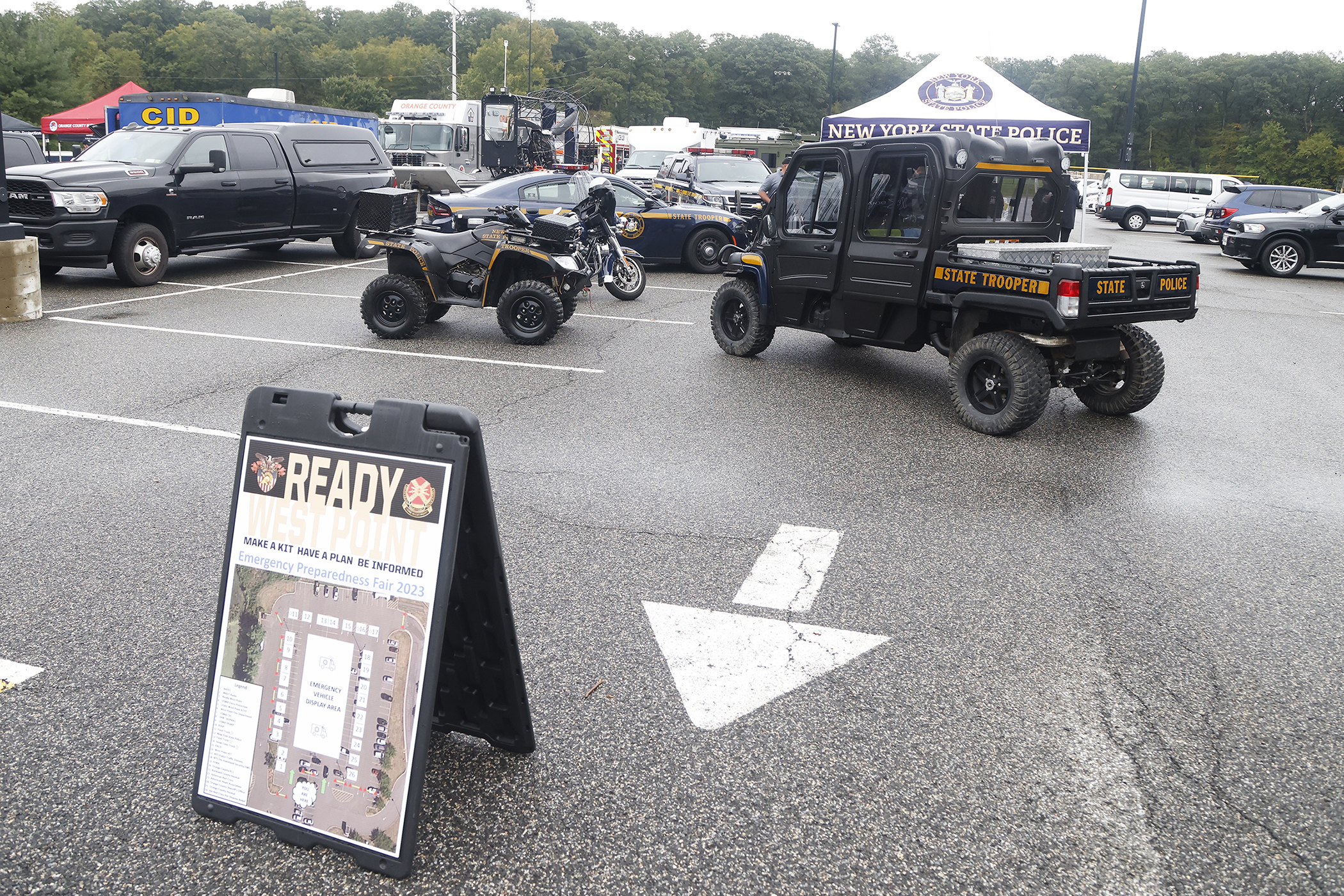 A few hundred West Point community members braved the chilly, inclement weather as the Directorate of Plans, Training, Mobilization and Security hosted the annual Emergency Preparedness Fair Sept. 30 at the West Point Post Exchange parking lot.   (Photo by Eric S. Bartelt/PV)