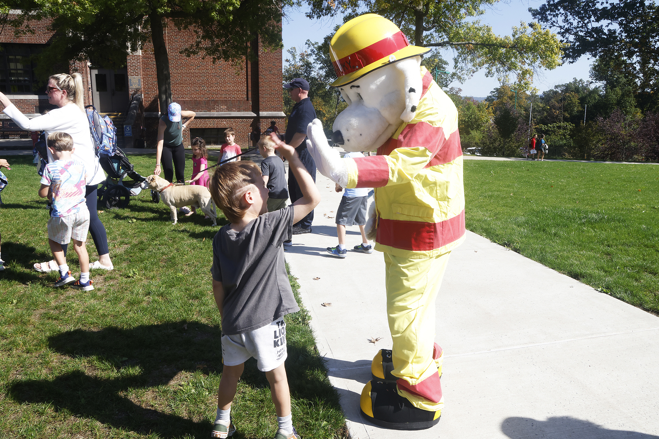 With a commitment to ensuring the safety and security of those living, working and visiting West Point, U.S. Army Garrison West Point and the West Point Fire Department (WPFD) teamed up for a Fire Prevention Week Proclamation signing Oct. 4 at the West Point Middle School (WPMS).    (Photo by Eric S. Bartelt/PV)