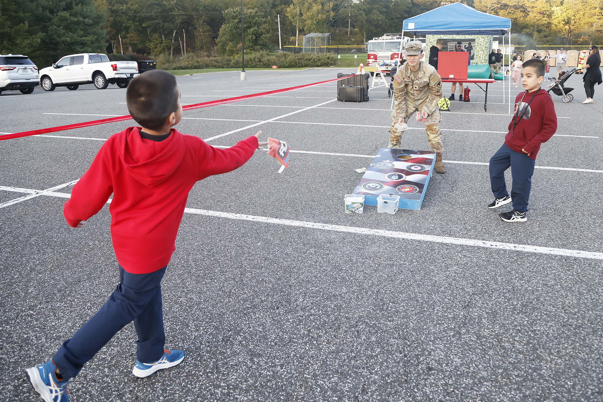 The West Point Fire Department (WPFD) presented its annual Open House for the West Point community Oct. 11 at H Lot in the Post Exchange parking lot. The WPFD offered activities to the children including the Kids Firefighting Obstacle Course with firefighting gear, Fire Extinguisher Training, Bounce House, Fire Truck displays, Cornhole, Dunk a Firefighter and the announcement of the Fire Prevention Week Poster Contest winners.   (Photo by Eric S. Bartelt/PV)