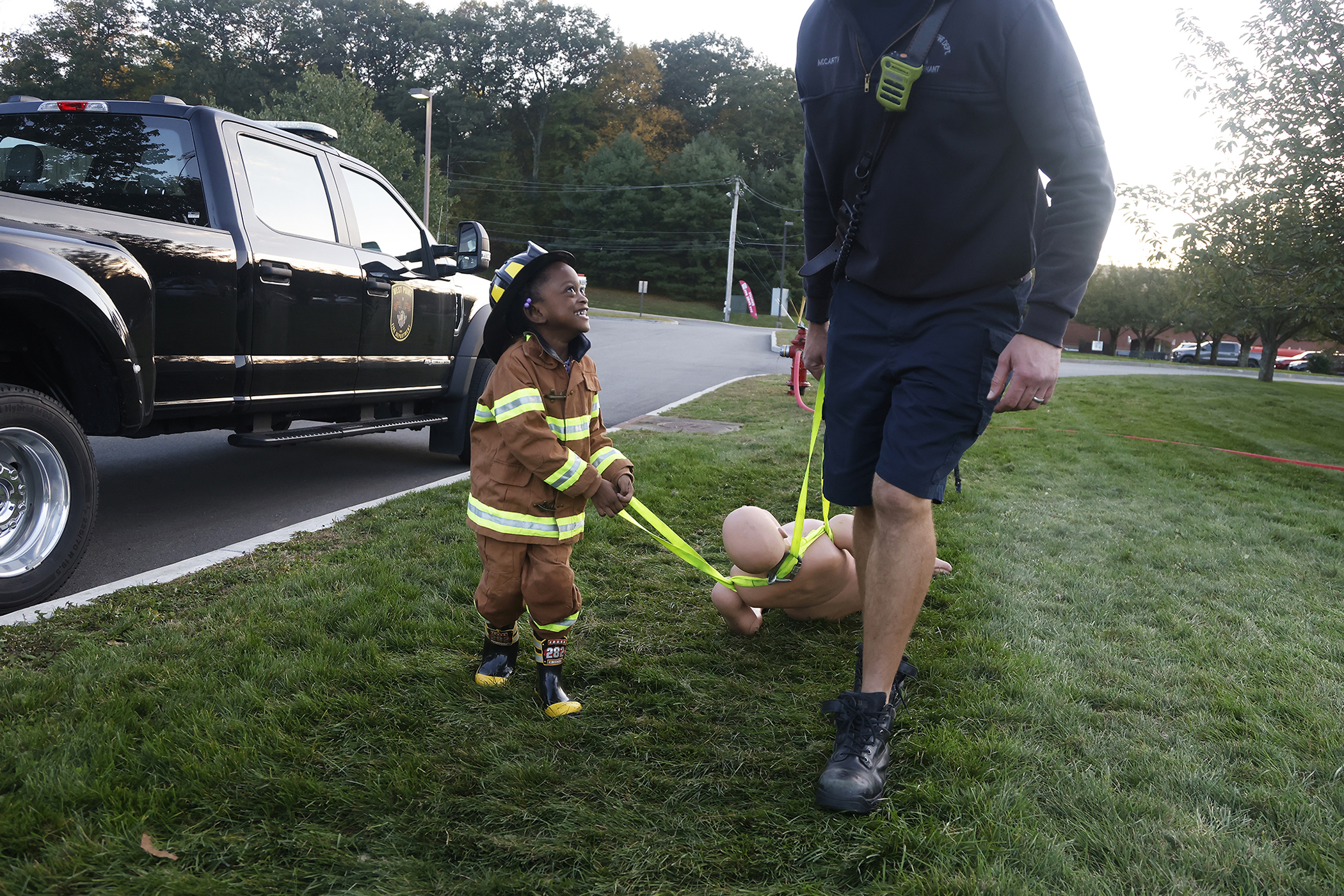 The West Point Fire Department (WPFD) presented its annual Open House for the West Point community Oct. 11 at H Lot in the Post Exchange parking lot. The WPFD offered activities to the children including the Kids Firefighting Obstacle Course with firefighting gear, Fire Extinguisher Training, Bounce House, Fire Truck displays, Cornhole, Dunk a Firefighter and the announcement of the Fire Prevention Week Poster Contest winners.   (Photo by Eric S. Bartelt/PV)