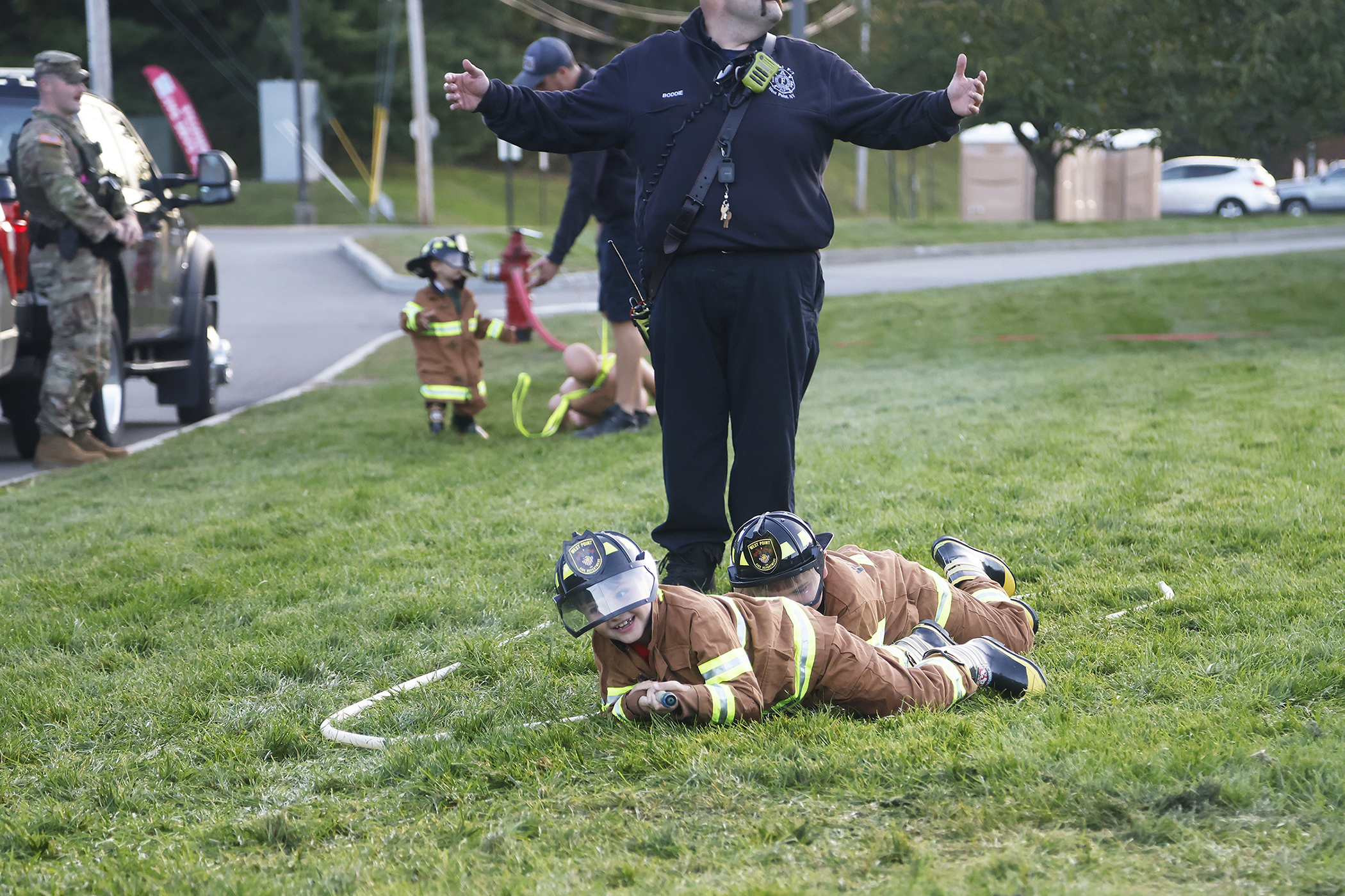 The West Point Fire Department (WPFD) presented its annual Open House for the West Point community Oct. 11 at H Lot in the Post Exchange parking lot. The WPFD offered activities to the children including the Kids Firefighting Obstacle Course with firefighting gear, Fire Extinguisher Training, Bounce House, Fire Truck displays, Cornhole, Dunk a Firefighter and the announcement of the Fire Prevention Week Poster Contest winners.   (Photo by Eric S. Bartelt/PV)