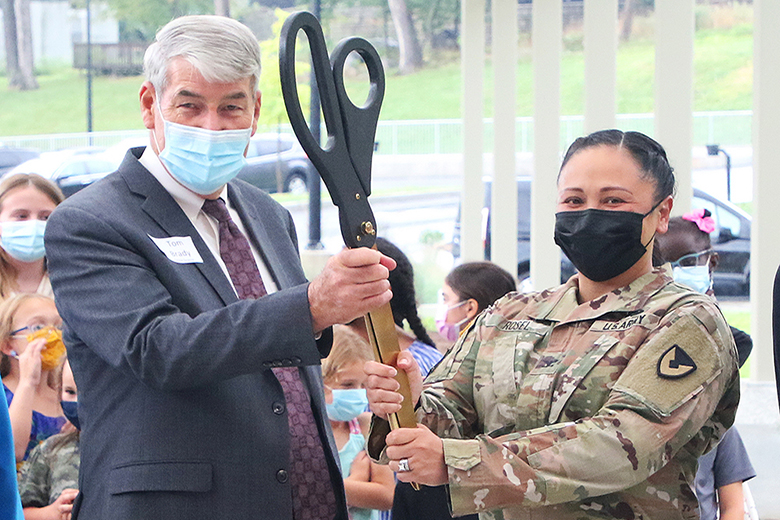 (Above from left to right) U.S. Army Corps of Engineers Commander and District Engineer, New York District Col. Matthew Luzzatto, U.S. Army Garrison West Point Command Sgt. Maj. Rusty Lane, Department of Defense Education Activity Americas Director of Student Excellence Dr. Judith Minor, U.S. Army Garrison West Point Commander Col. Evangeline Rosel, DODEA Director Tom Brady and West Point Elementary School Project Engineer Tim Pillsworth cut the ribbon during the West Point Elementary School Ribbon Cutting 