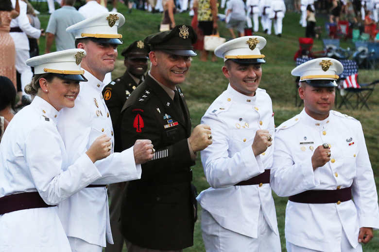 Superintendent Steven W. Gilland, USMA Class of 1990, shows off his ring with four Class of 2023 cadets following the ring ceremony.    Photo by Capt. David Hoy/USMA PAO