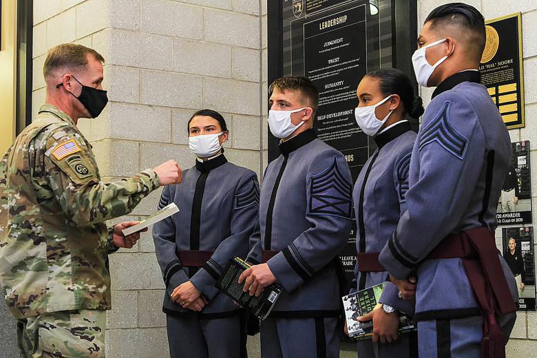 (From left to right) Class of 2021 Cadets Morgan Walsh, Beaux Guffey, Gabrielle White and Jacob Bueno (Right) listen intently as U.S. Corps of Cadets Commandant Brig. Gen. Curtis A. Buzzard imparted words of wisdom to the awardees and runners-up explaining the importance of the award and Moore’s book, ‘We Were Soldiers Once ... and Young: Ia Drang - the Battle That Changed the War in Vietnam’ during the ninth annual Lt.  Gen. Hal Moore Warrior Athlete of Excellence Award ceremony Nov. 12 at Arvin Cadet Phys