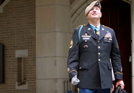 Sgt. 1st Class Leroy Petry looks at the architecture of Taylor Hall as he first arrives in West Point, New Year.