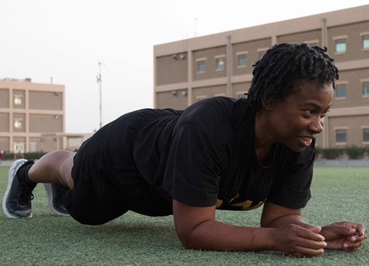  Cadet performing a plank for the Army Combat Fitness Test