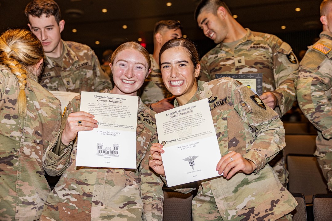 Two cadets show off their branch agreement.