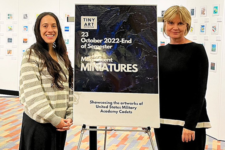 The U.S. Military Academy Library unveiled the tiny art exhibit — Magnificent Miniatures — of 95 pieces of original artwork on Oct. 23 and is now open to view. The idea to host a Tiny Art Show, featuring miniature canvases painted by USMA cadets, came from Programming and Event Librarian Lori Mulloolyʼs (bottom left photo to the right) vision. Miniature art is a genre of small-scale art that includes paintings, prints, sculptures and more and has a long history of its own. This program and exhibit