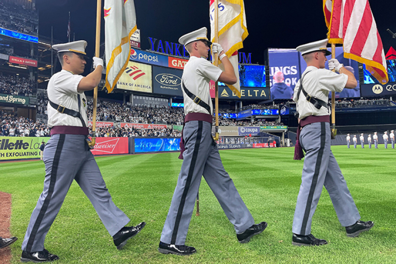 Members of the U.S. Corps of Cadets presented the colors (above and bottom left) while the West Point Band Vocal Quartet sang a rendition of the National Anthem before Game 1 of the American League Division Series Oct. 11 at Yankee Stadium.  				        Photos by Frank DeMaro/USMA PAO