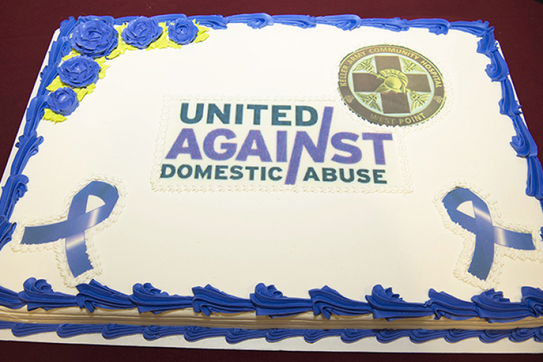 U.S. Military Academy Superintendent, Lt. Gen. Steven W. Gilland, was joined by Col. Anthony J. Bianchi, U.S. Army Garrison West Point commander; Col. Brianna M. Perata, Keller Army Community Hospital, West Point Health Service Area commander; Command Sgts. Maj. Michael J. Coffey, Michel R. Fraser and Jan “Eddyˮ Miller in signing the Army Domestic Violence Awareness Proclamation for October at Keller Community Hospital on Oct. 6. (Bottom right) Shaniece R. Lewis receives a plaque for her service to the 