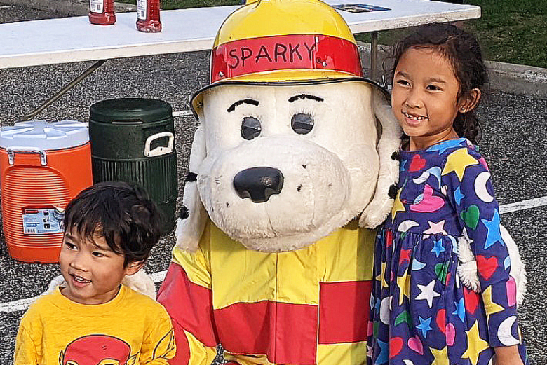 Members of the West Point community attended the West Point Fire Department’s Open House event at West Point’s Commissary and PX Parking Lot on Oct. 12. Firefighters provided food and information, while demonstrating their gear, equipment and techniques they use when responding to an emergency.    		(Photo by Dave Conrad/Garrison PAO) 