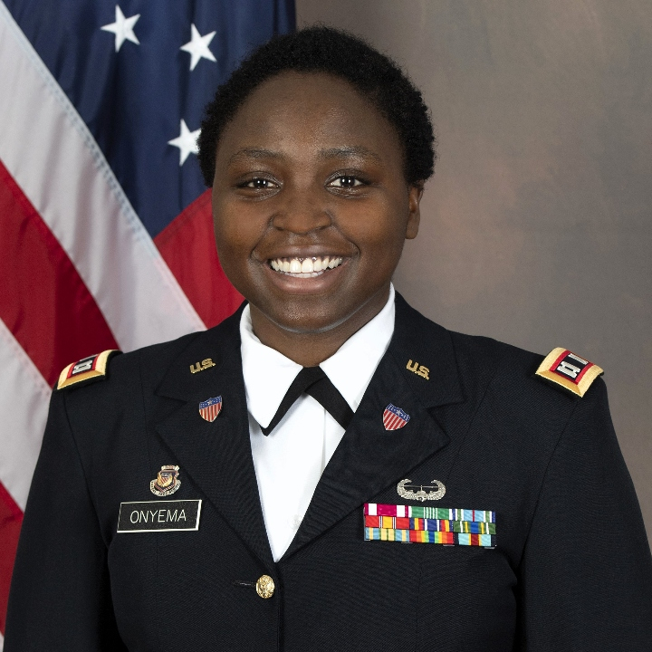CPT Krystal Onyema in ASU in front of American flag.