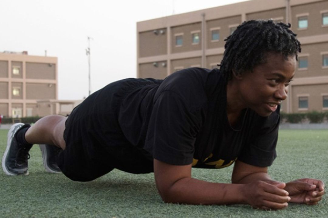  Cadet performing a plank for the Army Fitness Test