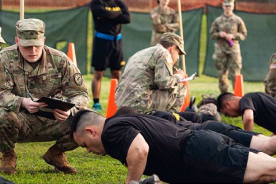  Cadet performing a hand release push-up for the Army Fitness  Test