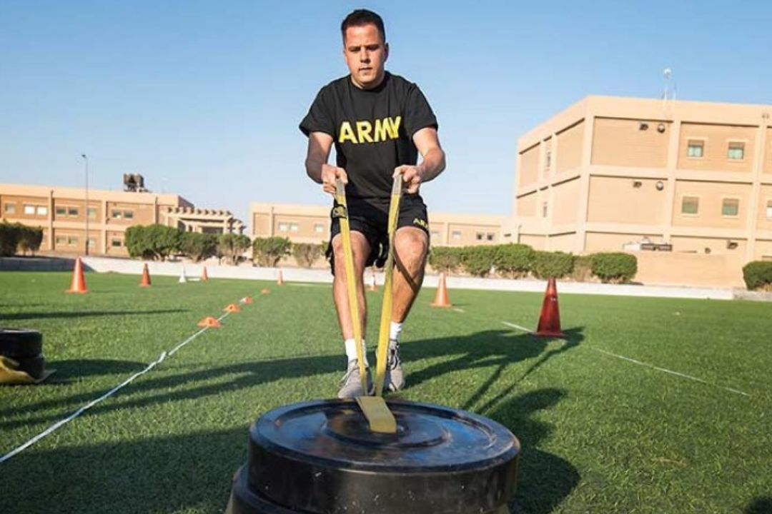  Cadet performing a sprint-drag-carry exercise for the Army Fitness Test