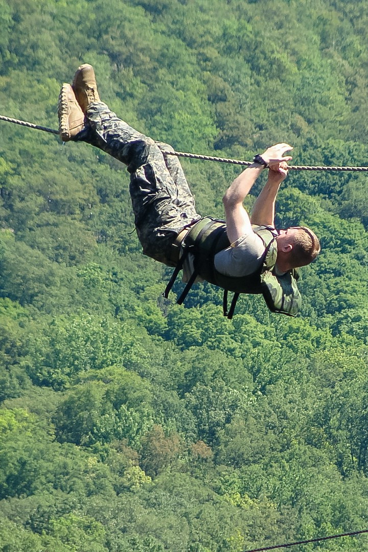 Cadets in 1st Company complete the Water Obstacle Course (WOC) that consists of the balance beam, the wobbly steps, the horizontal rope, and the slide for life. With the assistance from the Department of Physical Education (DPE), cadets safely navigate each portion of the WOC successfully.