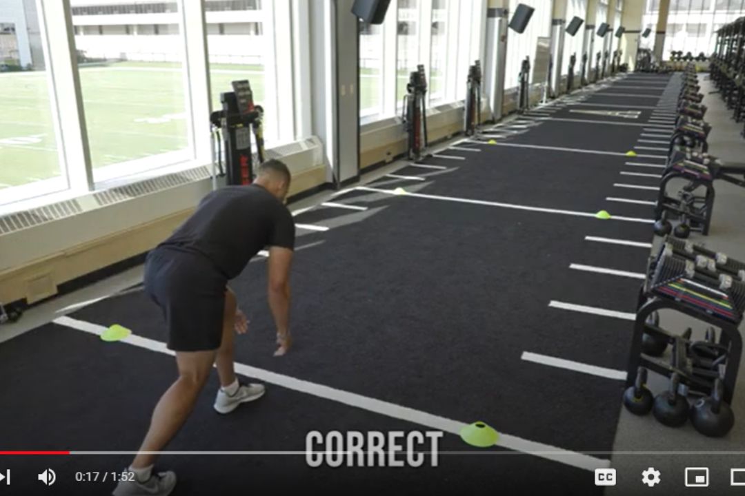 Man practices shuttle run.