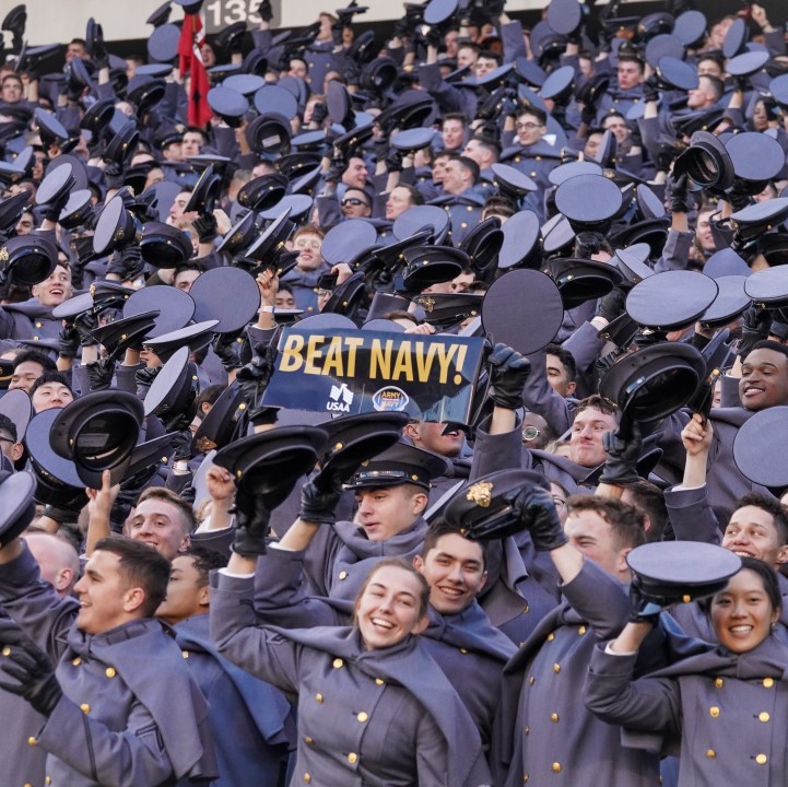 Cadets root for the Black Knights in the stands at the Army-Navy football game.
