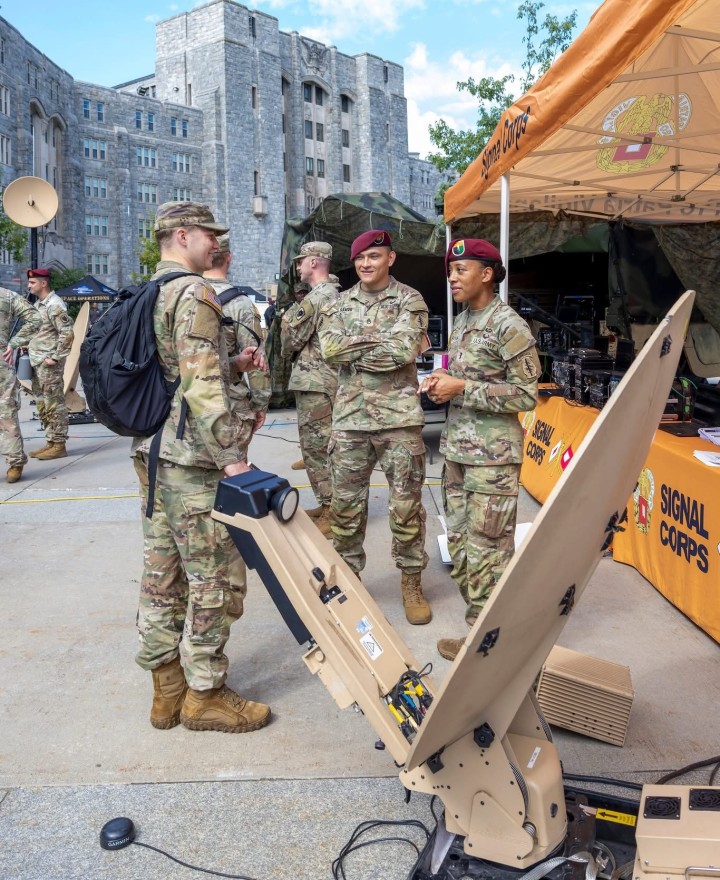 A cadet talks to branch representatives during Branch Week.