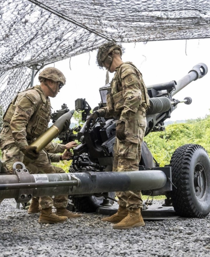 Cadets fire artillery at summer training.