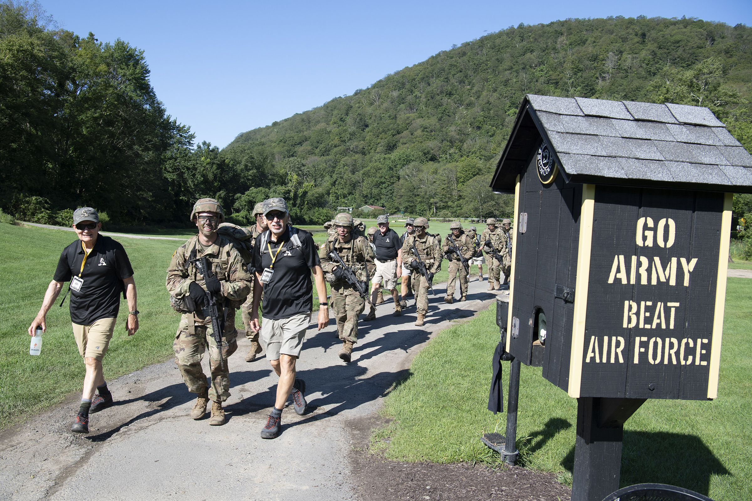 The U.S. Military Academy Class of 2028 completes its Cadet Basic Training with March Back on Aug. 12 at West Point. The new cadets marched 14 miles from Camp Buckner to the Victor Constant Ski Slope where they had a brief respite before making their final journey to the Superintendent's house to finish the march. They were accompanied by several graduates on the route, including many from their 50-year affiliate class, the Class of 1978. (Photo by John Pellino/USMA PAO)