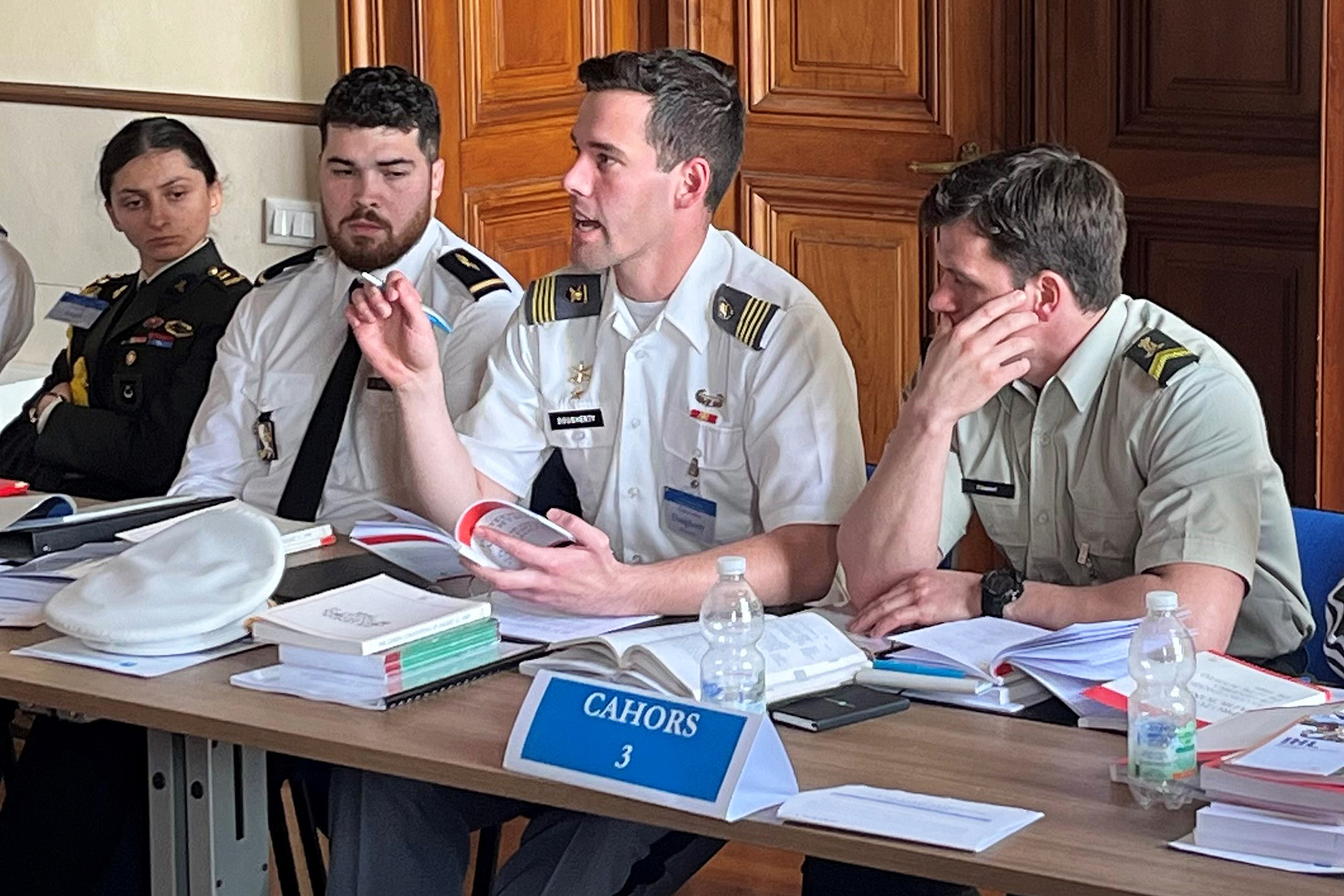 Class of 2024 Cadet Colton Dougherty raises a crucial legal concern during another intense JOC session. 