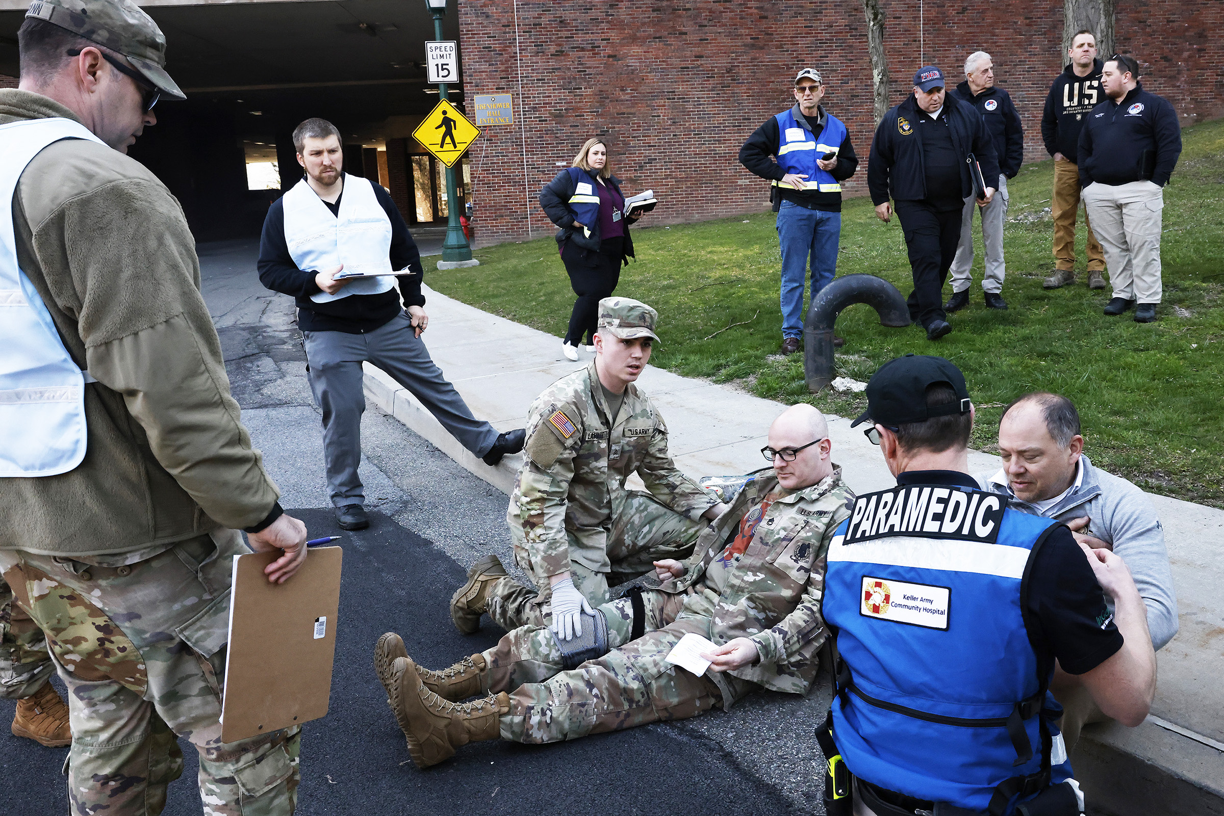 West Point conducted its annual Integrated Protection Exercise on March 13 to assess the installation’s emergency response and recovery capabilities with a realistic mass casualty (MASCAL) scenario.   The scenario involved a traffic accident with a Directorate of Public Works snowplow truck and post shuttle bus with several occupants onboard along Pitcher Road, in the vicinity of Eisenhower Hall and Gillis Field House.   Role-players across the installation portrayed patients, allowing first responders to