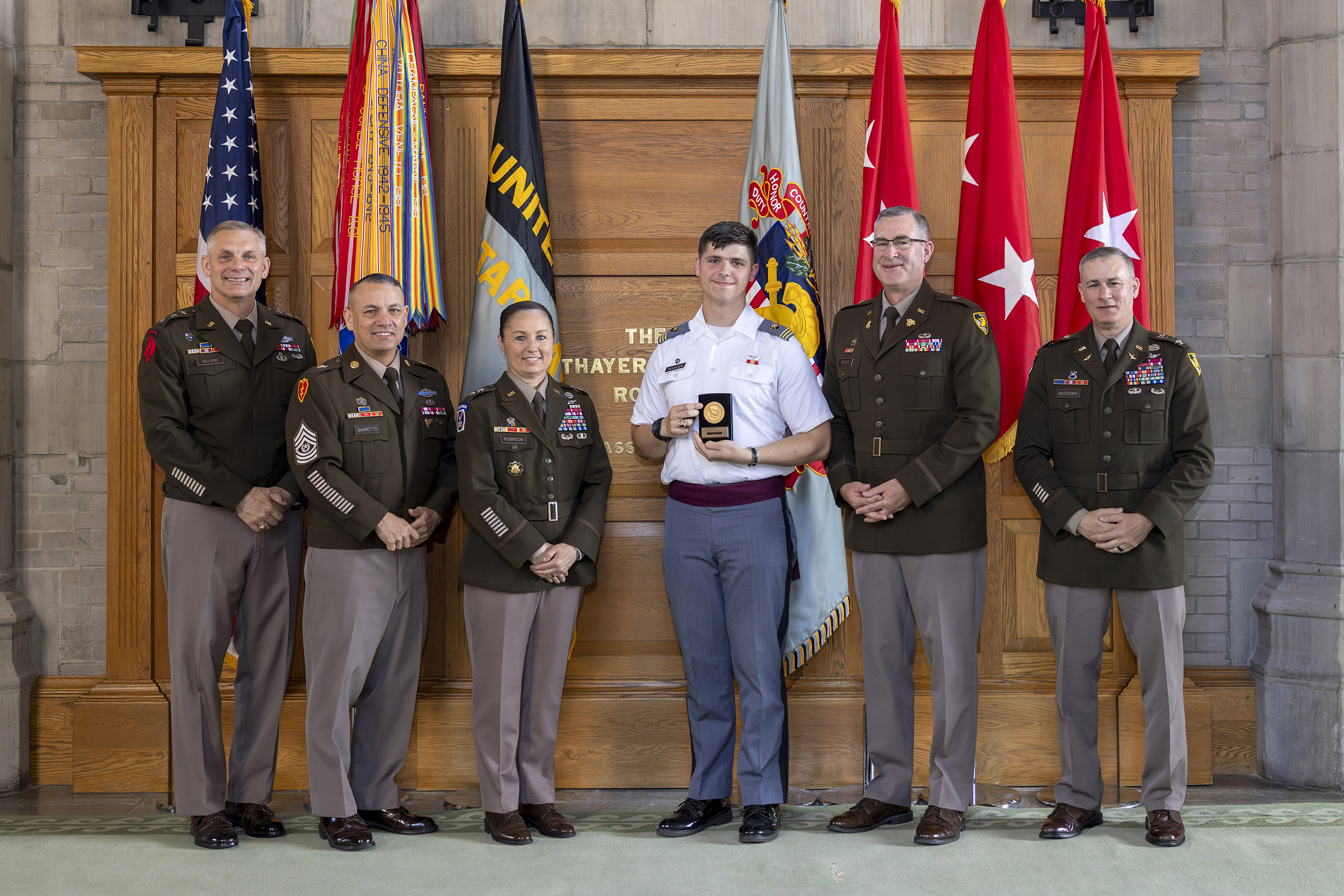 The Simon Center for the Professional Military Ethic hosted the John J. Pershing Reflective Essay Award ceremony on May 22 at the Thayer Award Room. Established in 2006, the award is meant to encourage cadets to reflect on their experiences at West Point and gain a better understanding for how the institution has helped them prepare for the profession of arms and to strengthen their resolve to serve the nation honorably as a commissioned officer. This year, the top three cadets who earn medallions were Clas