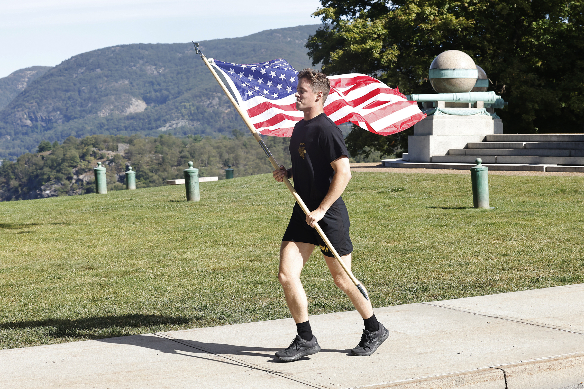 Members of 2nd Battalion, 4th Regiment of the U.S. Military Academy Corps of Cadets commemorated the victims of the 9/11 terrorist attacks in 2001 by running the American Flag throughout Central Area to the West Point Cemetery and back throughout the day on Sept. 11 at West Point.  (Photo by Eric S. Bartelt/USMA PAO)