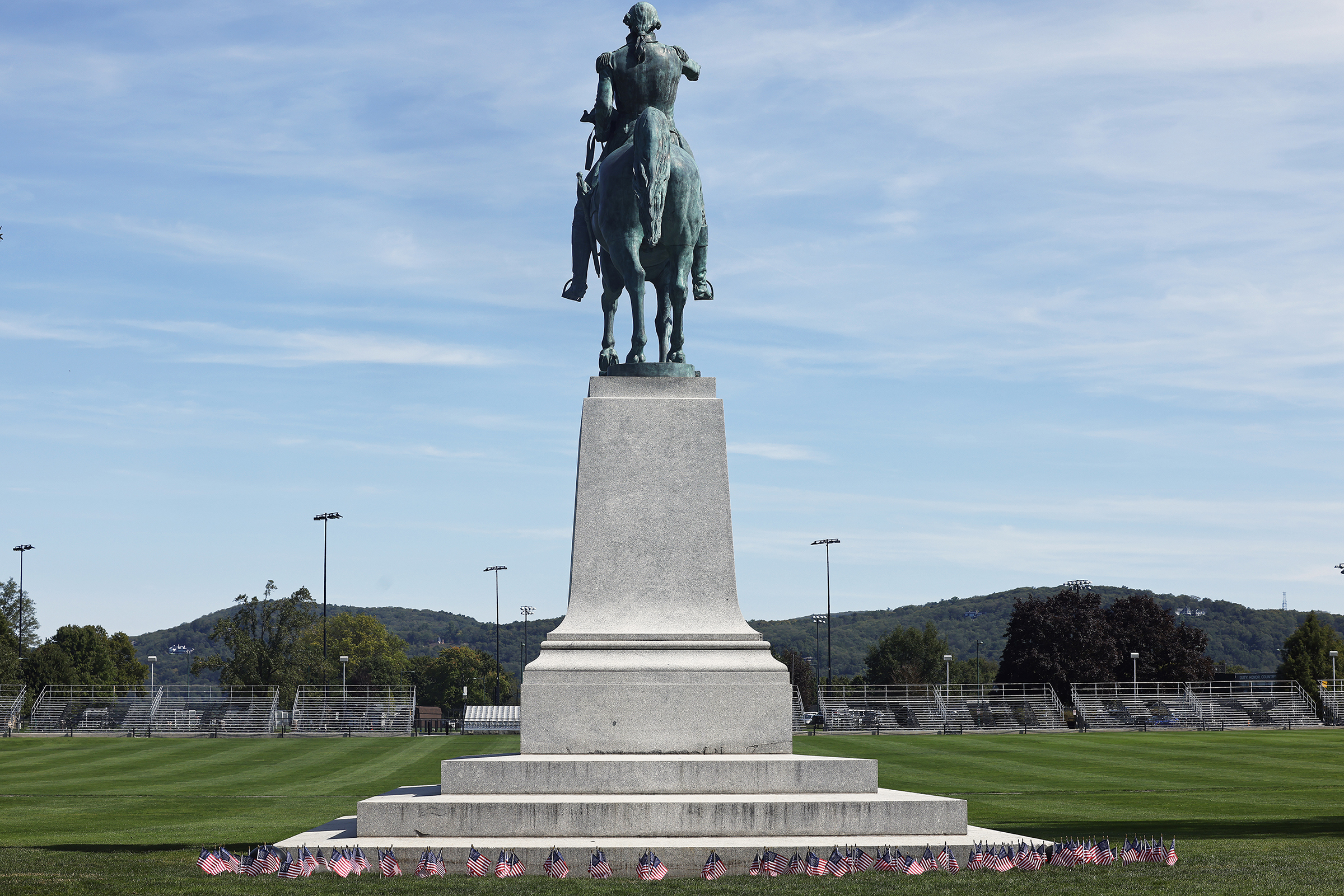 Members of 2nd Battalion, 4th Regiment of the U.S. Military Academy Corps of Cadets commemorated the victims of the 9/11 terrorist attacks in 2001 by running the American Flag throughout Central Area to the West Point Cemetery and back throughout the day on Sept. 11 at West Point.  (Photo by Eric S. Bartelt/USMA PAO)