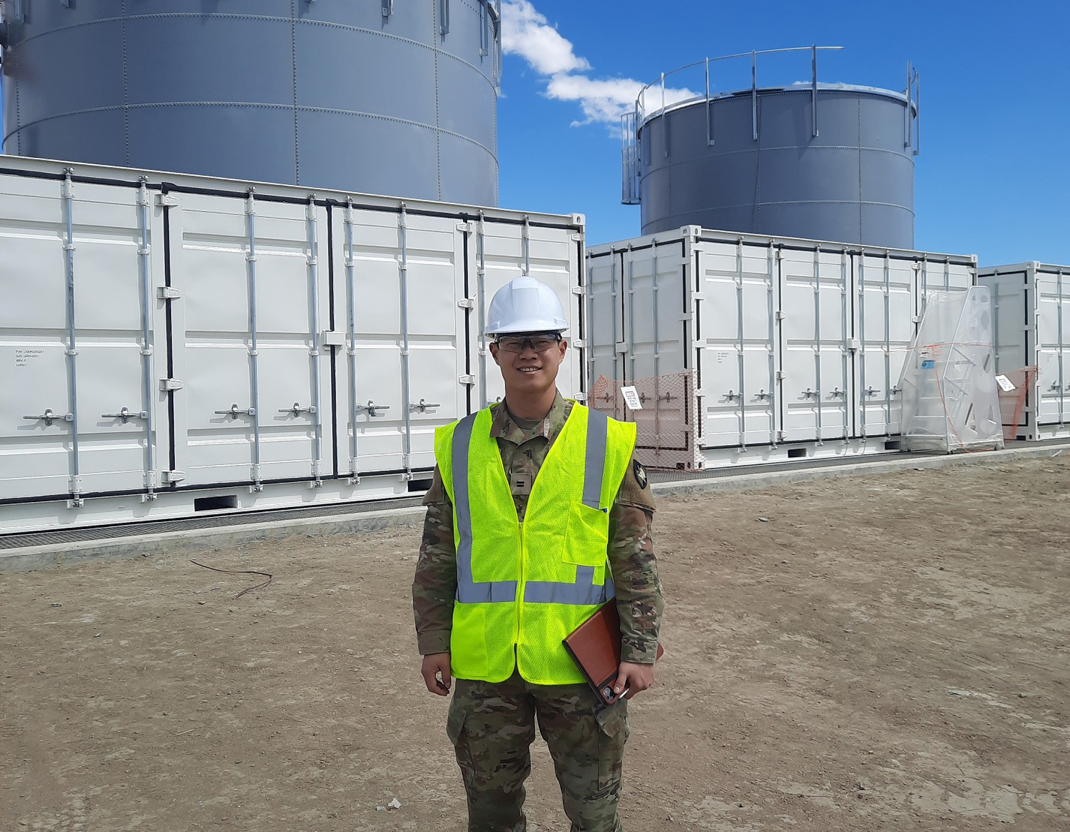 A cadet learns about advanced power technology at the recently installed flow battery system at Fort Carson, Colo., applying concepts learned in class to real Army systems. 