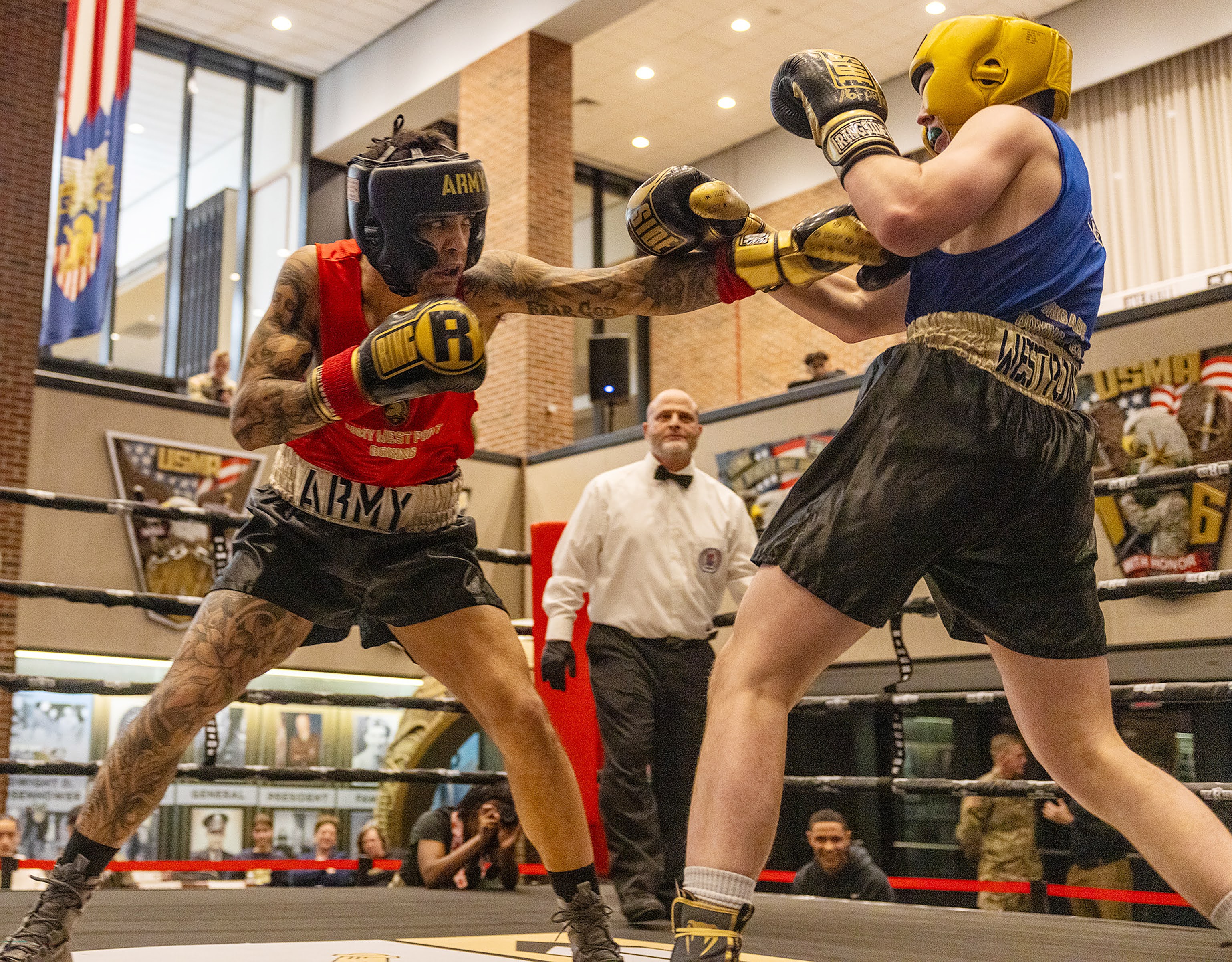 The U.S. Military Academy hosted the 70th annual Brigade Boxing Open Finals on Feb. 20 at Crest Hall.  There were 10 bouts on the evening, incuding seven men's bouts and three women's fights. Overall, there were 18 BBO winners with the other fights happening the previous day.  There were eight new BBO champions and 10 champions who now won multiple BBO titles.  (Photo by Eric S. Bartelt / USMA PAO-VI)