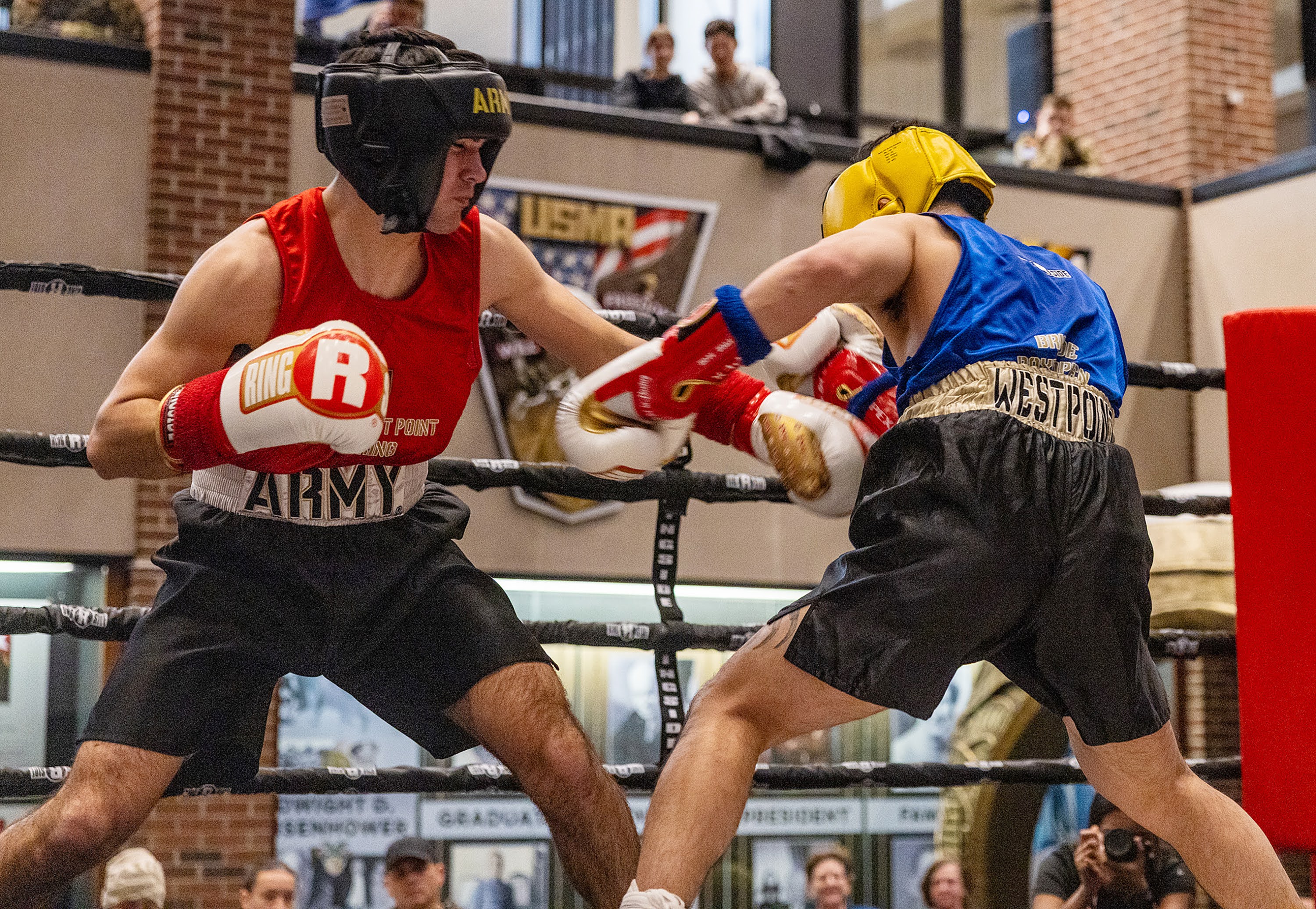 The U.S. Military Academy hosted the 70th annual Brigade Boxing Open Finals on Feb. 20 at Crest Hall.  There were 10 bouts on the evening, incuding seven men's bouts and three women's fights. Overall, there were 18 BBO winners with the other fights happening the previous day.  There were eight new BBO champions and 10 champions who now won multiple BBO titles.  (Photo by Eric S. Bartelt / USMA PAO-VI)