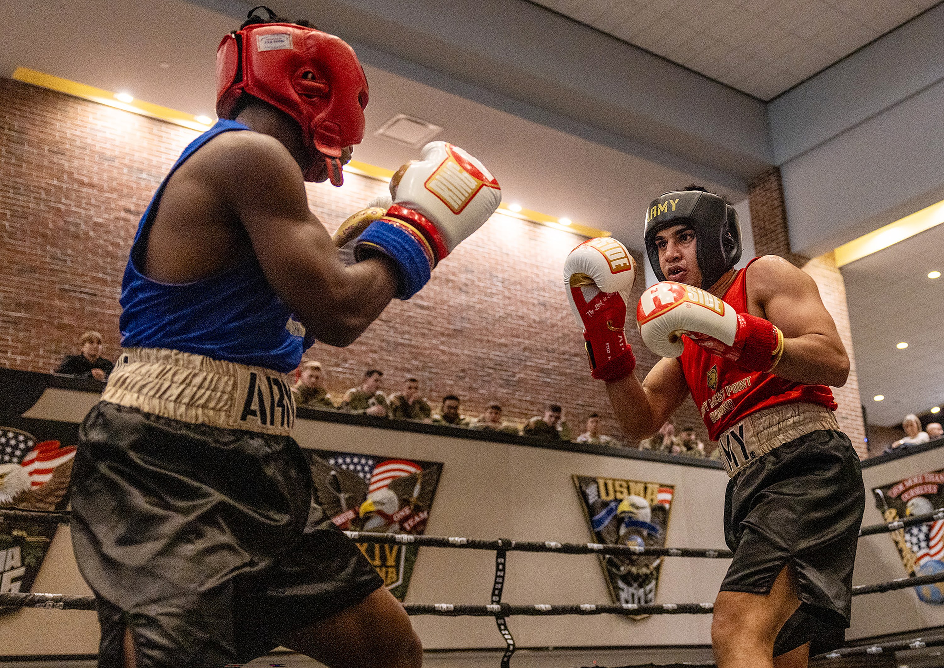 The U.S. Military Academy hosted the 70th annual Brigade Boxing Open Finals on Feb. 20 at Crest Hall.  There were 10 bouts on the evening, incuding seven men's bouts and three women's fights. Overall, there were 18 BBO winners with the other fights happening the previous day.  There were eight new BBO champions and 10 champions who now won multiple BBO titles.  (Photo by Eric S. Bartelt / USMA PAO-VI)