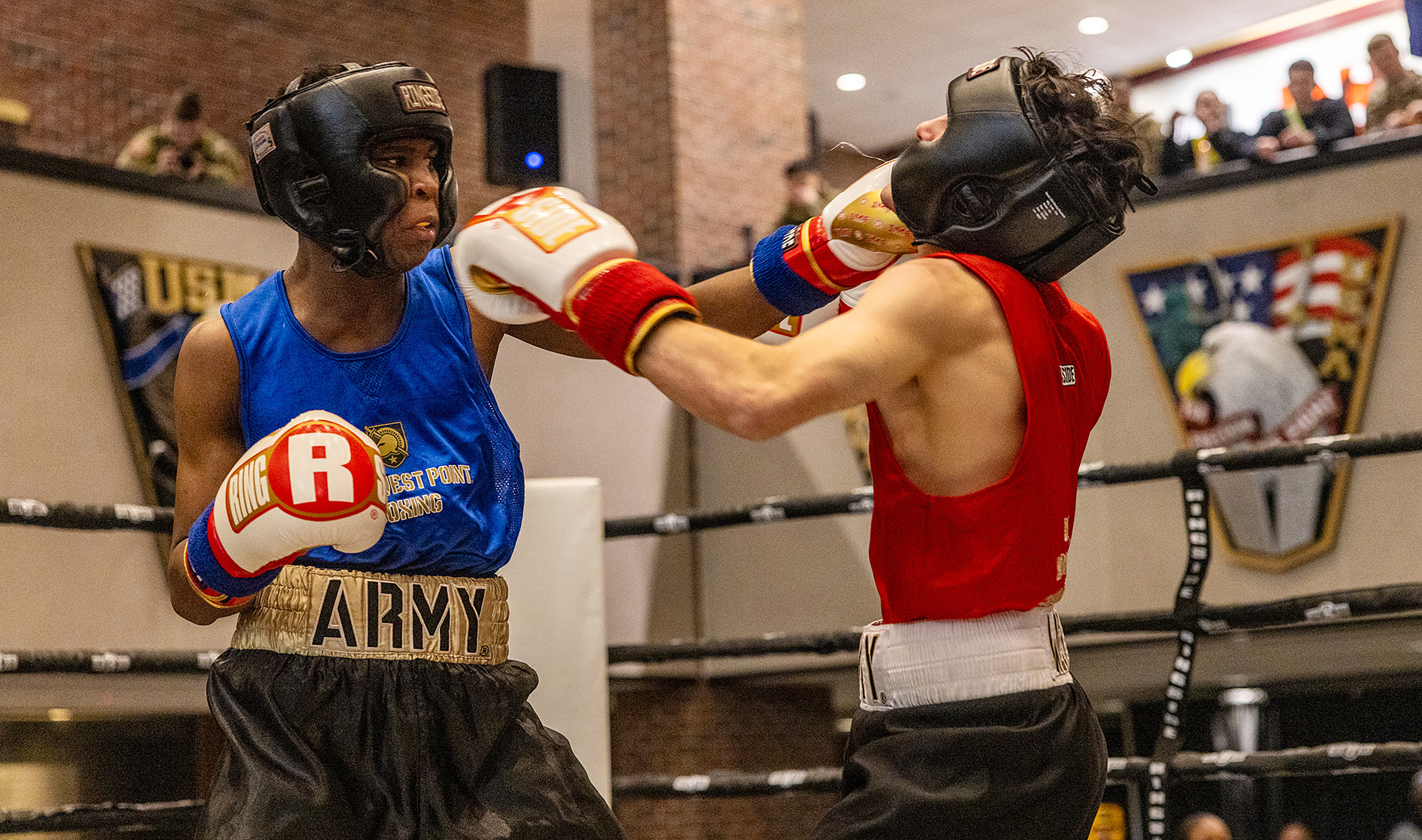 The U.S. Military Academy hosted the 70th annual Brigade Boxing Open Finals on Feb. 20 at Crest Hall.  There were 10 bouts on the evening, incuding seven men's bouts and three women's fights. Overall, there were 18 BBO winners with the other fights happening the previous day.  There were eight new BBO champions and 10 champions who now won multiple BBO titles.  (Photo by Eric S. Bartelt / USMA PAO-VI)