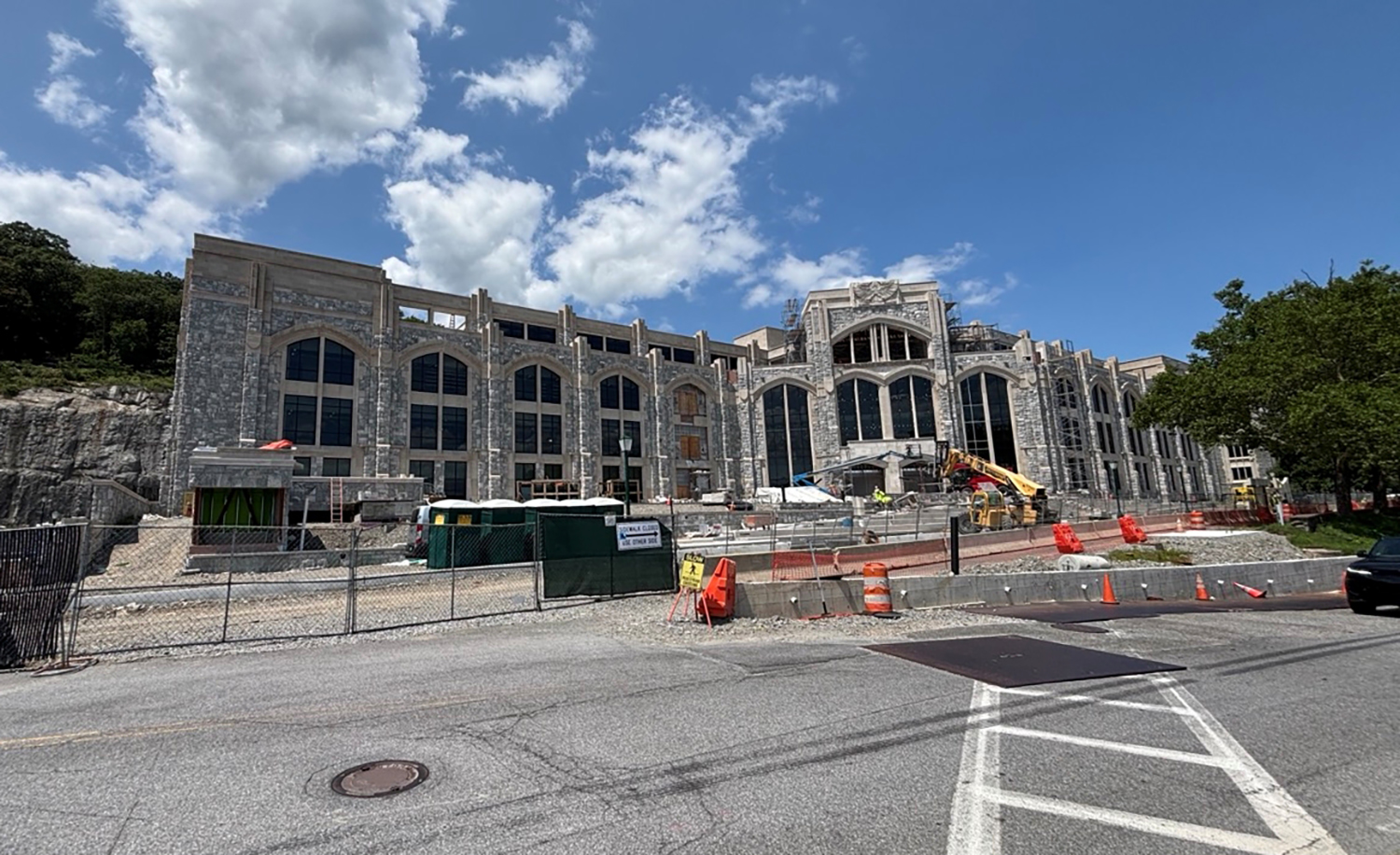 Front view of Goethals Hall (CEAC) under construction in July 2026. (Photo by Travis Soliz, USAISEC)
