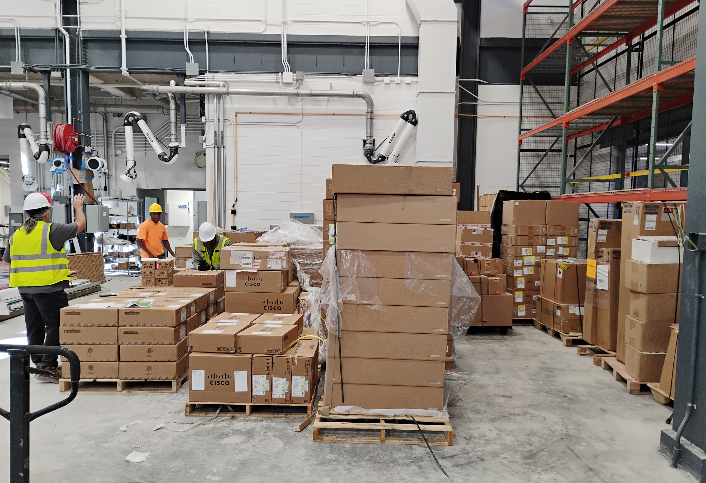 Travis Soliz, USAISEC Project Lead, conducting joint inventory of MUE delivery in Goethals Hall (CEAC) in October 2026 (Photo by John Buensalido, USAISEC)