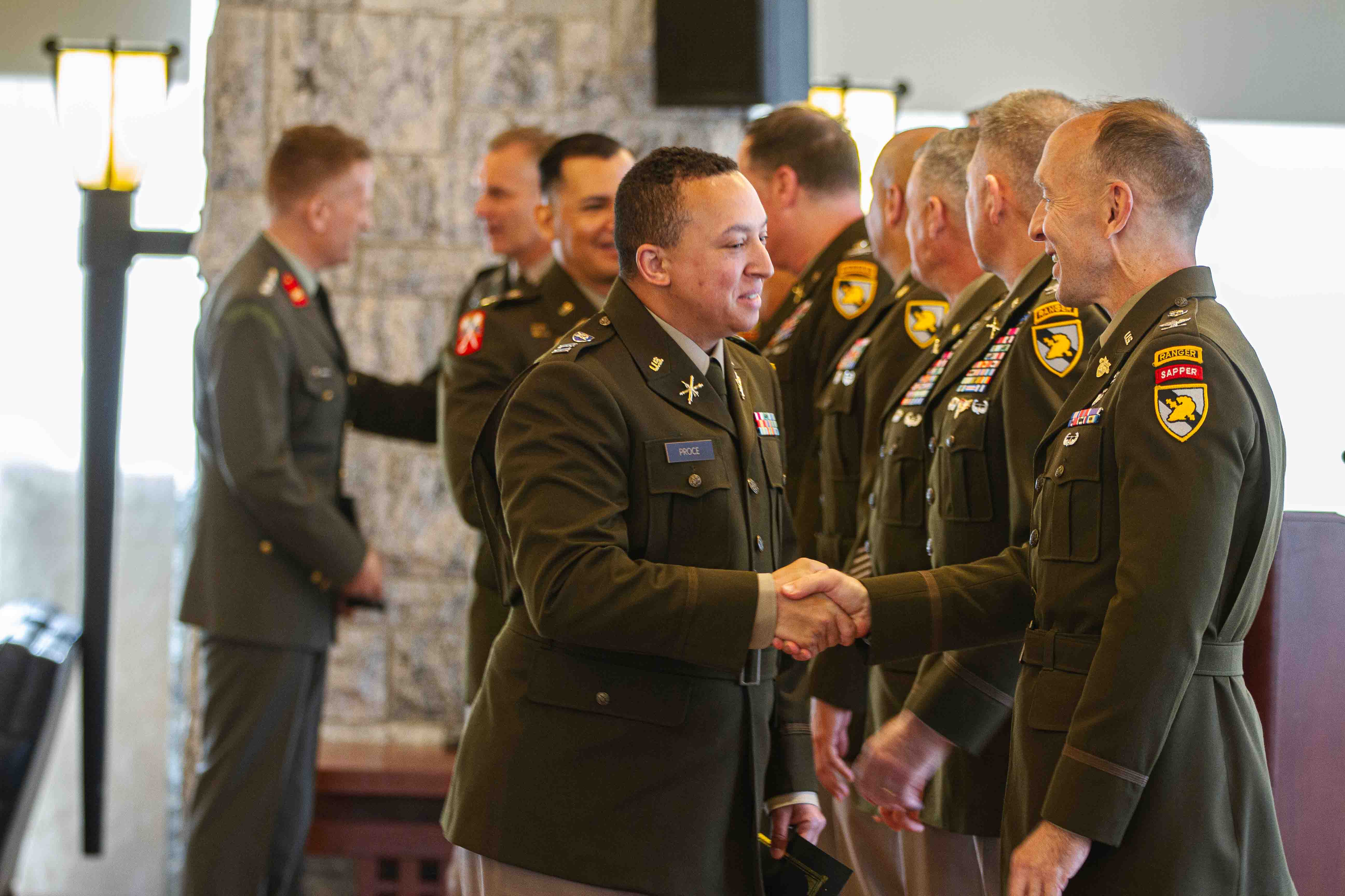 The U.S. Military Academy celebrated the efforts of the 18th Eisenhower Leader Development Program cohort at the Haig Room in Jefferson Hall as 17 officers received their diplomas, marking the successful completion of the ELDP Masters of Arts Program, where they completed their Master's Degree in Social-Organizational Psychology (Leader Development) from Teachers College, Columbia University on May 19. Photo by Jorge Garcia/ USMA PAO.