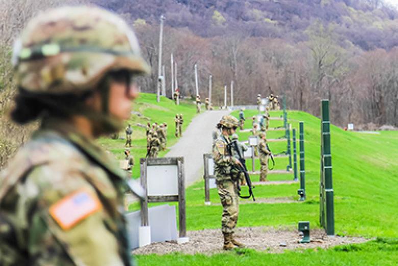 Competitors get ready to fire their M-4’s during the M-4 range portion of the 52nd Sandhurst Military Skills competition on Saturday. Company G-4 was recognized with the Marksmanship Award during the awards ceremony. 