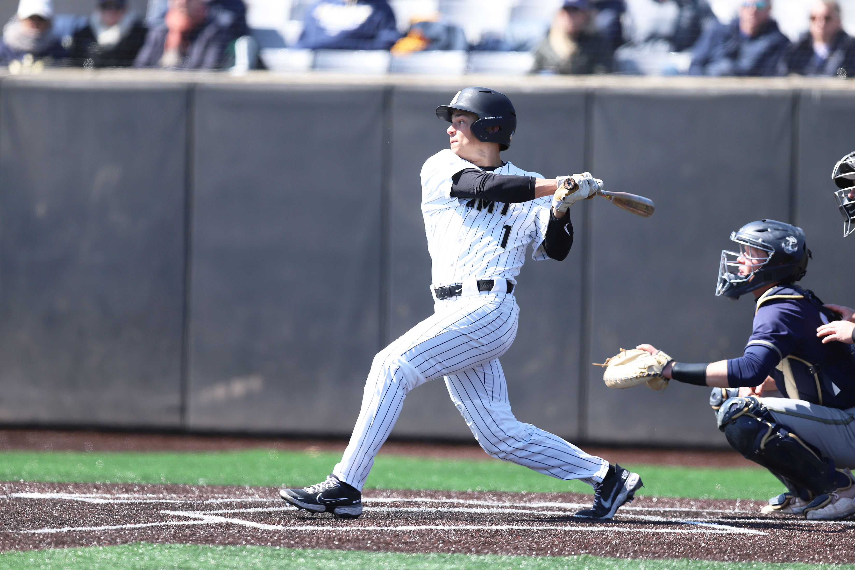 The Army West Point baseball team (15-12, 6-2 PL) defeated the Navy Midshipmen (14-15, 7-5, PL) 2-1 in Game 1 of April 3's doubleheader. Army's Addison Ainsworth secured the win for the Black Knights with a walk-off double in the bottom of the 10th inning. In Game 2, the Black Knights defeated the Midshipmen 5-0. Sam Ruta went 2-for-3, while scoring a run, three RBIs, a three-run home run and a double.   (Photo by Mady Salvani/Army Athletic Communications)