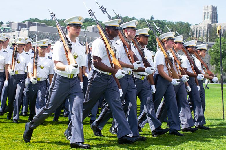 As the West Point Band played music, the new plebes progressed triumphantly into position for the ceremony dressed in their white over gray uniform. The cadets neatly filed into their companies and, as ordered, marched in formation during the pass in review as proud family members shouted praises to their plebes as they embark on their West Point experience to join the Long Gray Line.		