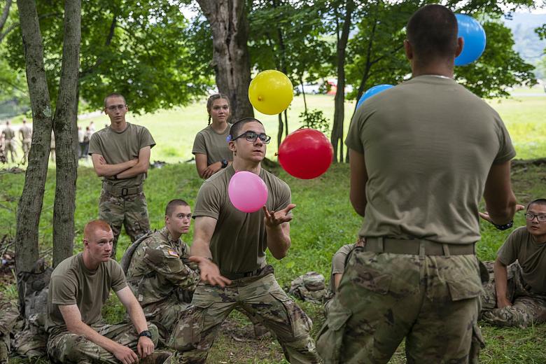 U.S. Military Academy Class of 2025 cadets participate in Wellness Day during Cadet Basic Training Aug. 7 at West Point. A new cadet balances balloons during a game as part of Wellness Day.   (U.S. Army Photo by Spc. Josue Patricio/27th PAD Unit)