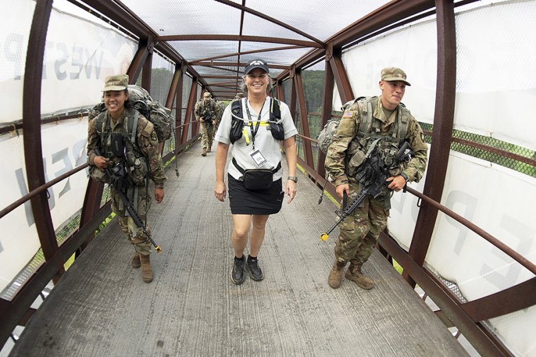 U.S. Military Academy Class of 1994 graduate Brandi Peasley walks with the new cadets during March Back Monday.