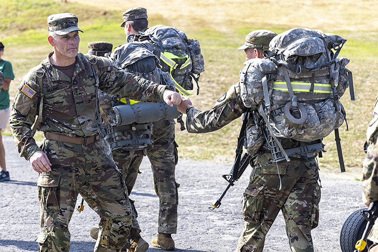 Superintendent Lt. Gen. Steven W. Gilland motivates the new cadets as they arrive at the West Point Ski Slope prior to the final leg of March Back.  			Photo by Christopher Hennen/USMA PAO