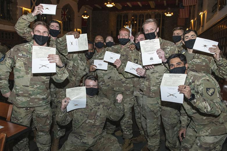 The cadets in the U.S. Military Academy’s Class of 2021 burst into cheers and celebrate after they unsealed their envelopes during West Point’s annual Branch Night Dec. 2 at Washington Hall. During the ceremony, 992 members of the class learned which of the 17 Army branches they were assigned. During Branch Night, 80% of the cadets received their top branch choice and 96% received one of their top three choices they worked hard for during their first three-and-a-half years at West Point. When meshing both